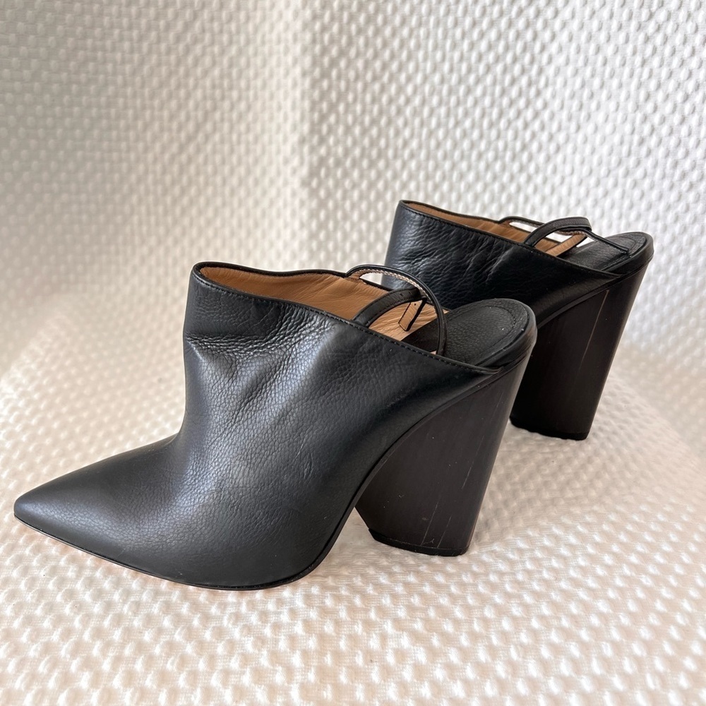 NWOT- Designer shoes. Woman’s fabulous high wedges